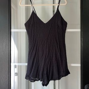 Kylie and Kendall Black Swiss Dot romper. Size medium. New with tags.